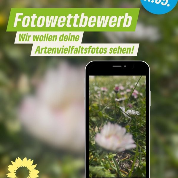 ein Handy mit dem Bild einer Blumenwiese im Display. Dazu der Text "Fotowettbewerb Wir wollen deine Artenvielfaltfotos sehen. Einsendeschluss 11.05.