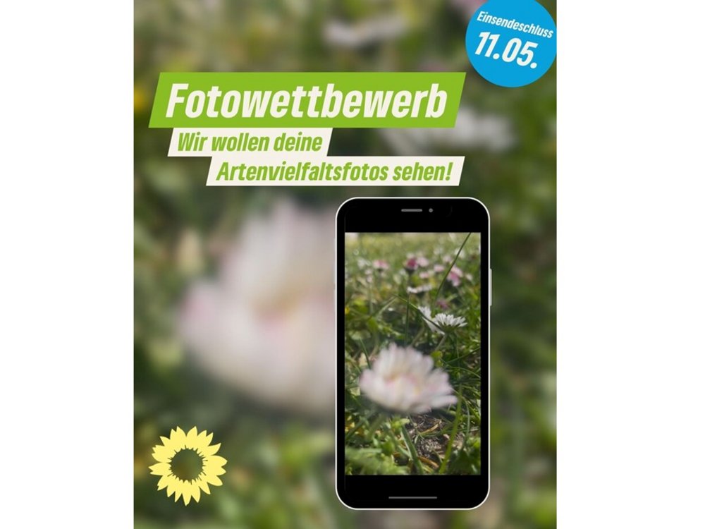 Ein Handy mit Foto einer Blume auf dem Bildschirm sowie dem Text "Fotowettbewerb - wir wollen deine Artenvielfaltfotos sehen!"